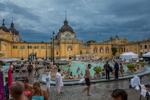 Steam rising from thermal pools at Budapest thermal baths like Lukács