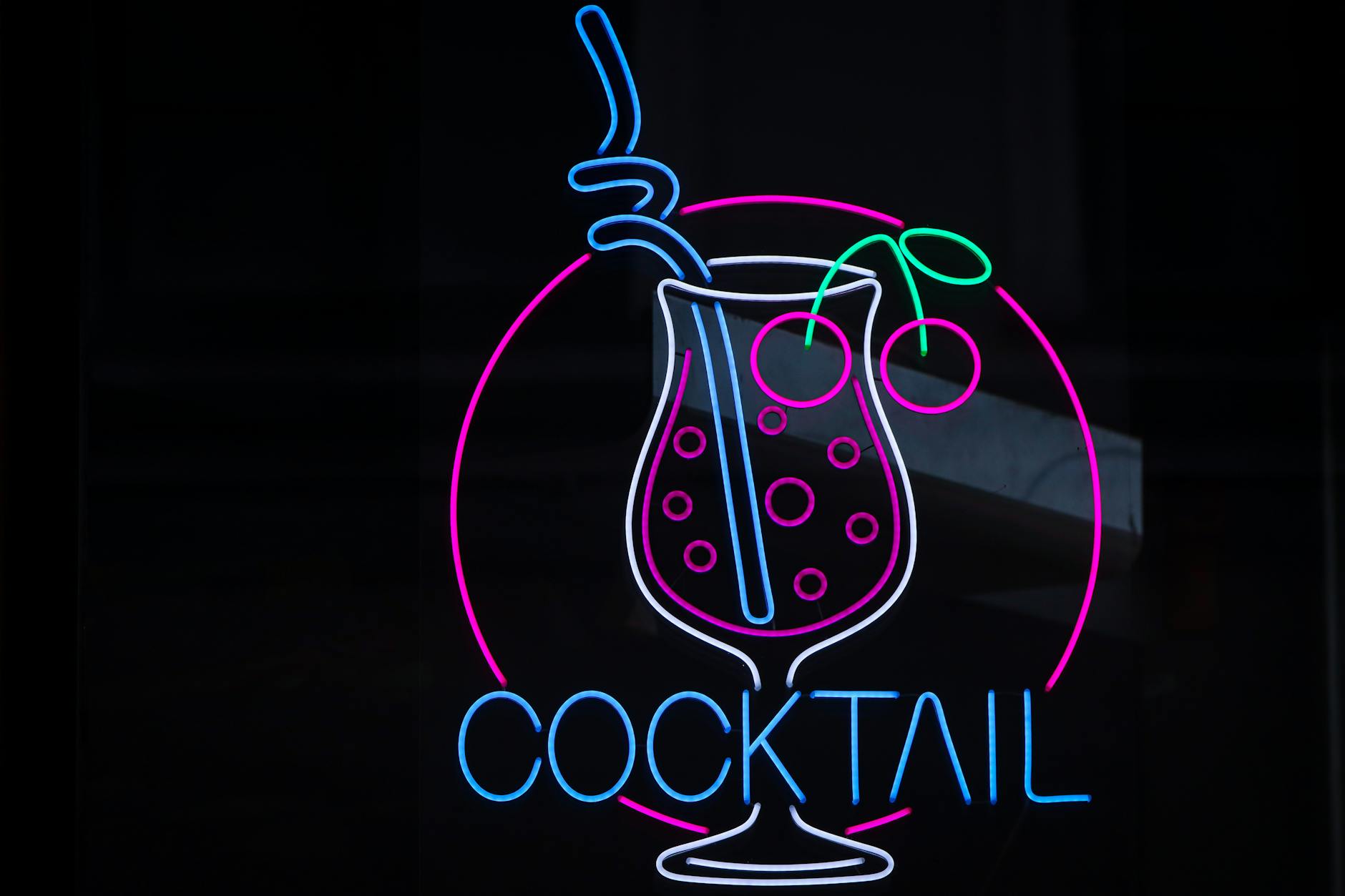Cocktail bar with neon lights and drinks