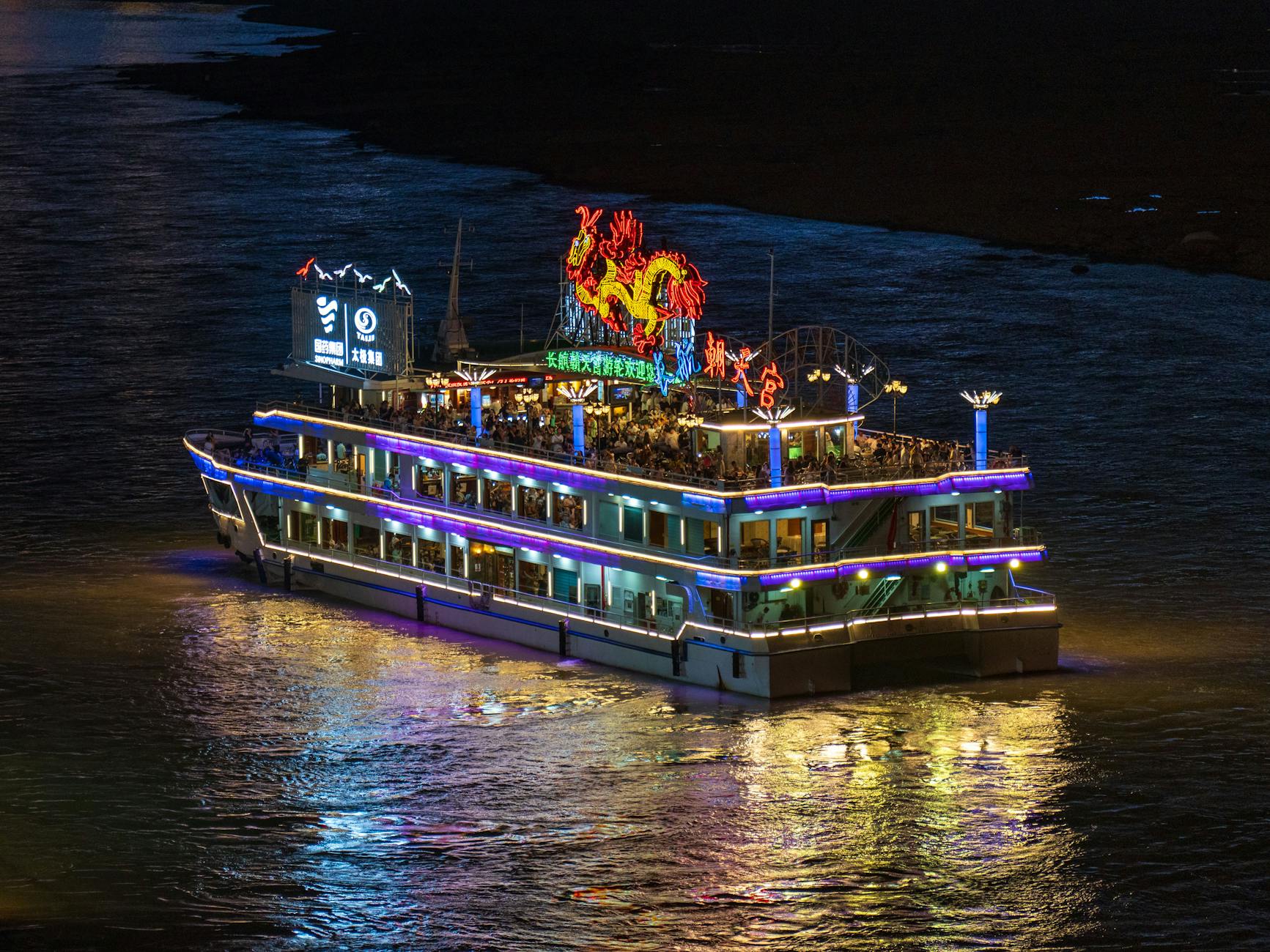 Party boat cruise on the river at night