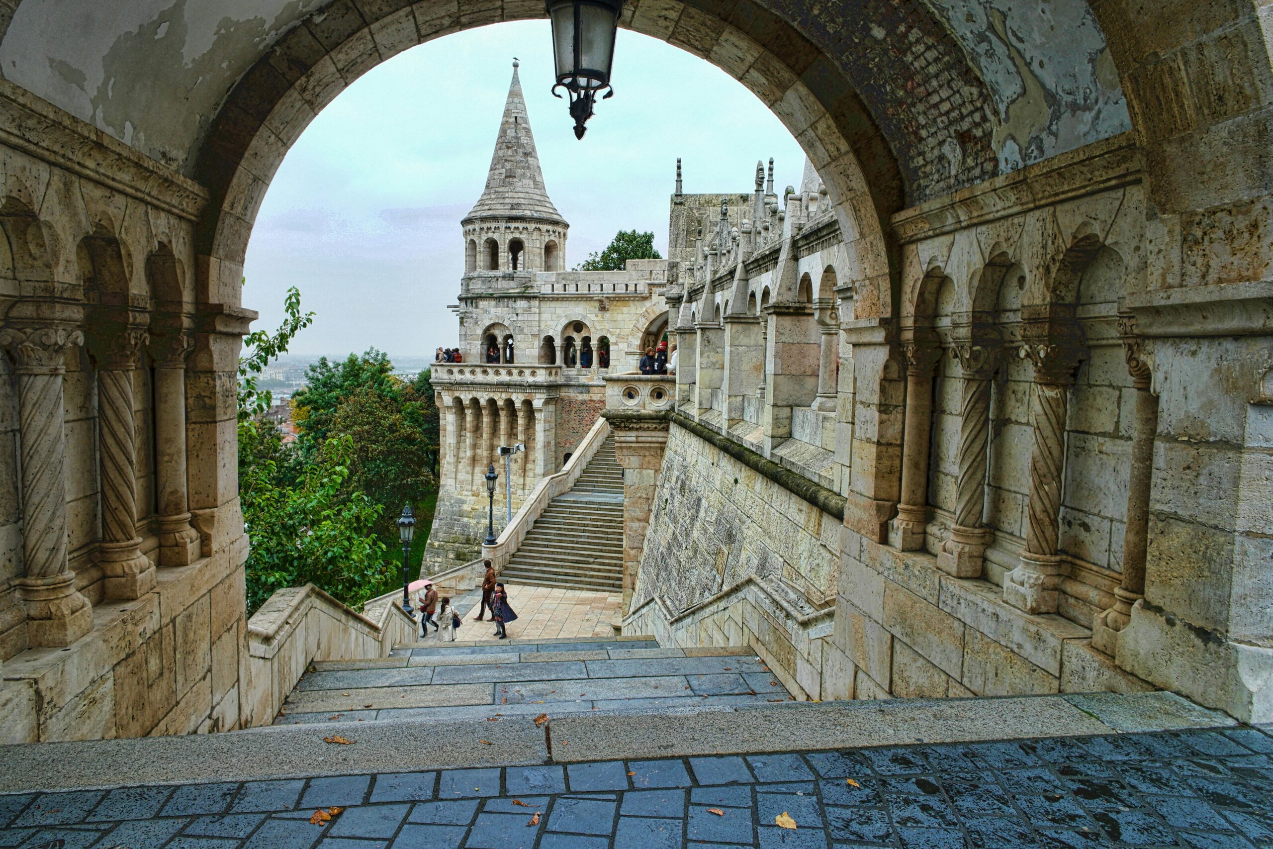 The white turrets and arcades of Fishermans Bastion beside Matthias Church on Castle Hill