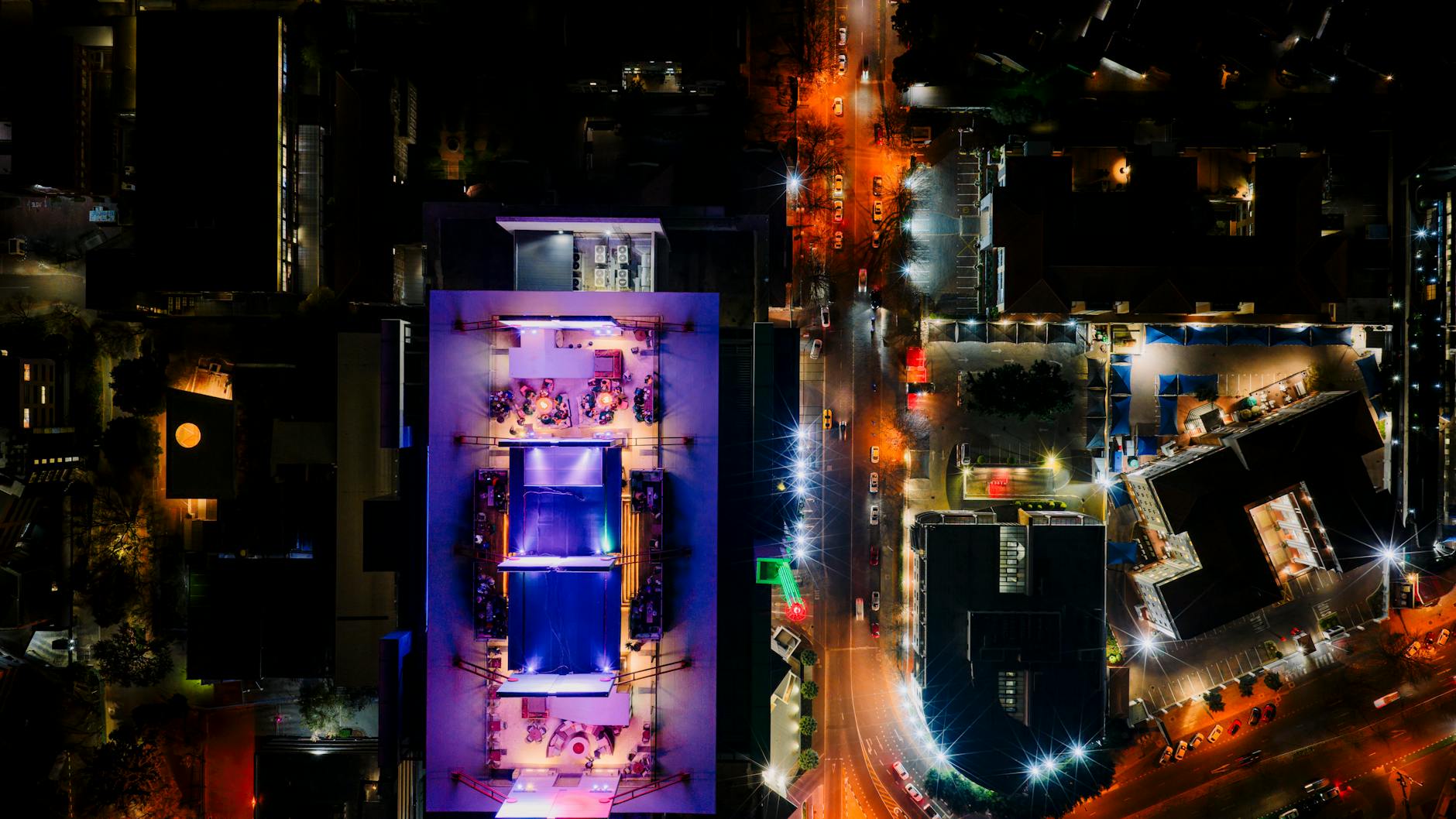 Rooftop bar with panoramic city view at night