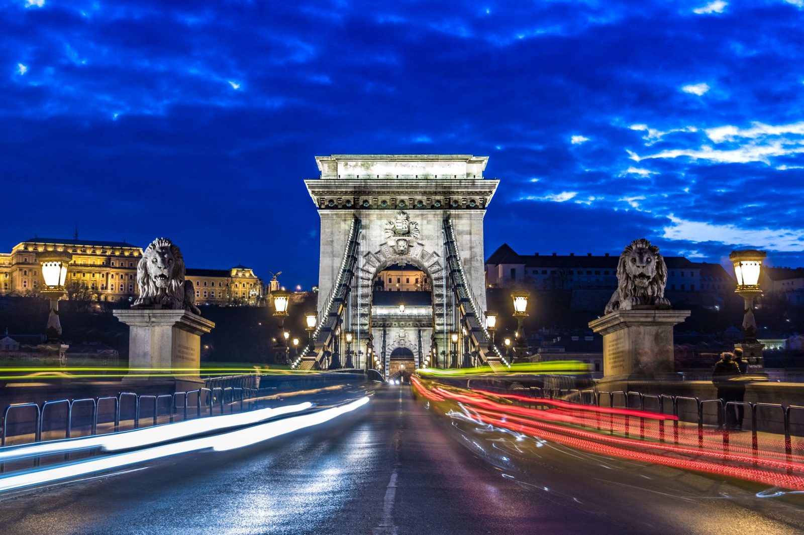 One of the stone lions guarding the Chain Bridge in Budapest