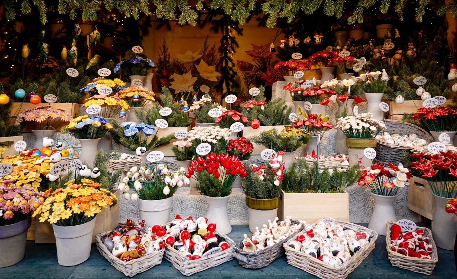Festively lit craft stalls at a Christmas market
