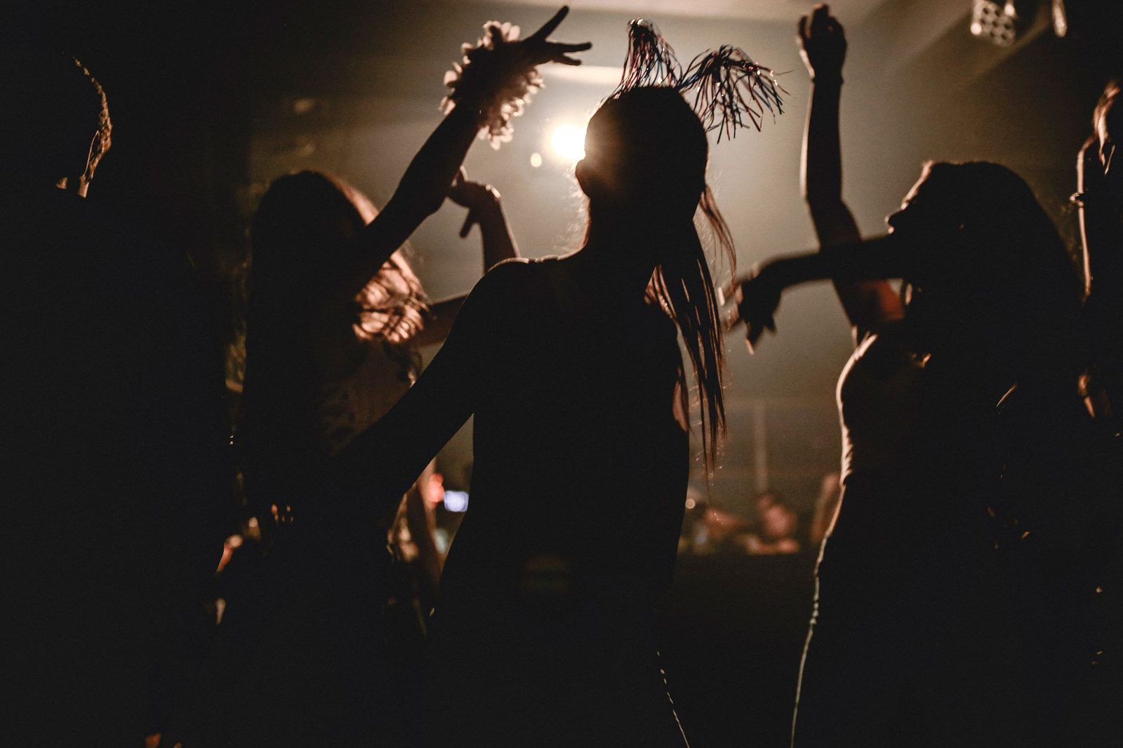 Clubbers dancing until dawn at a Budapest club