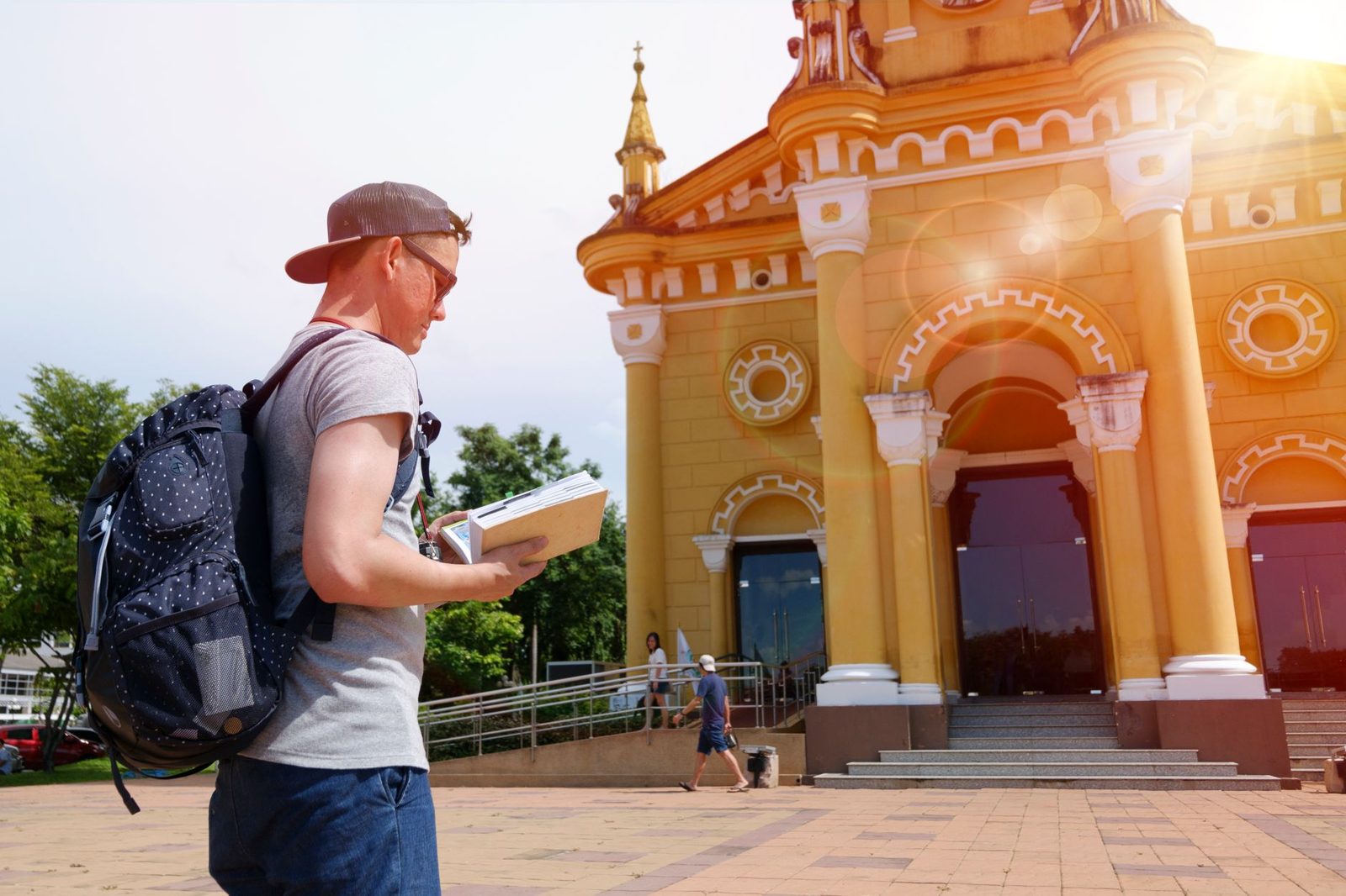 Backpacker setting out from a Budapest hostel