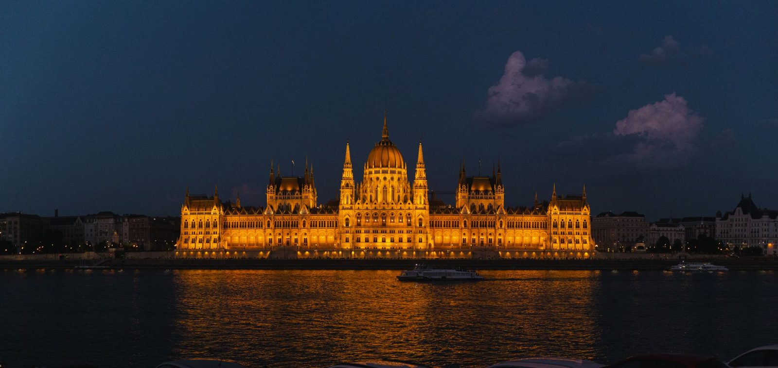 Budapest riverfront lit up at night, a free evening view