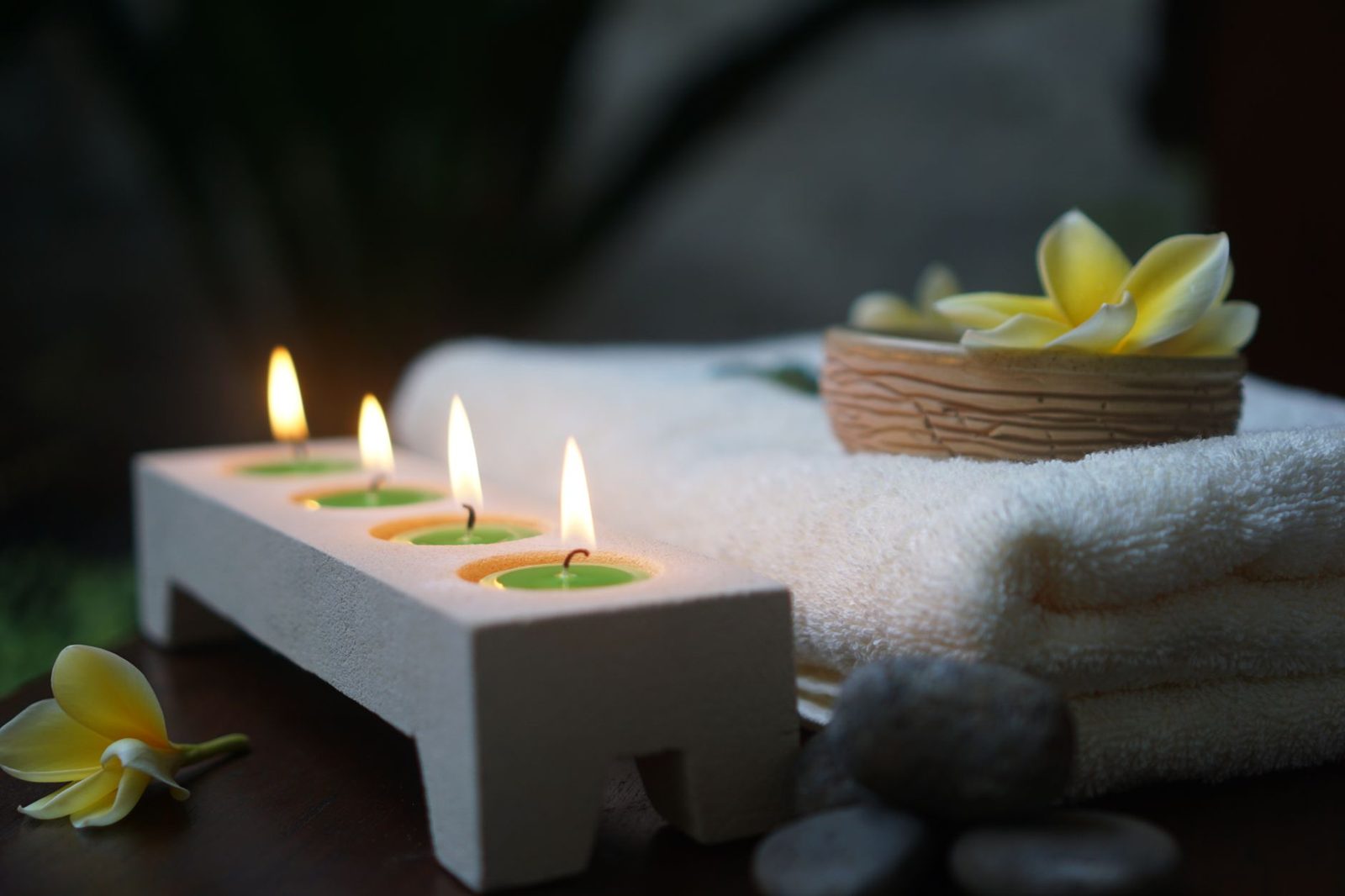 Candlelit relaxation room set up for a romantic spa visit
