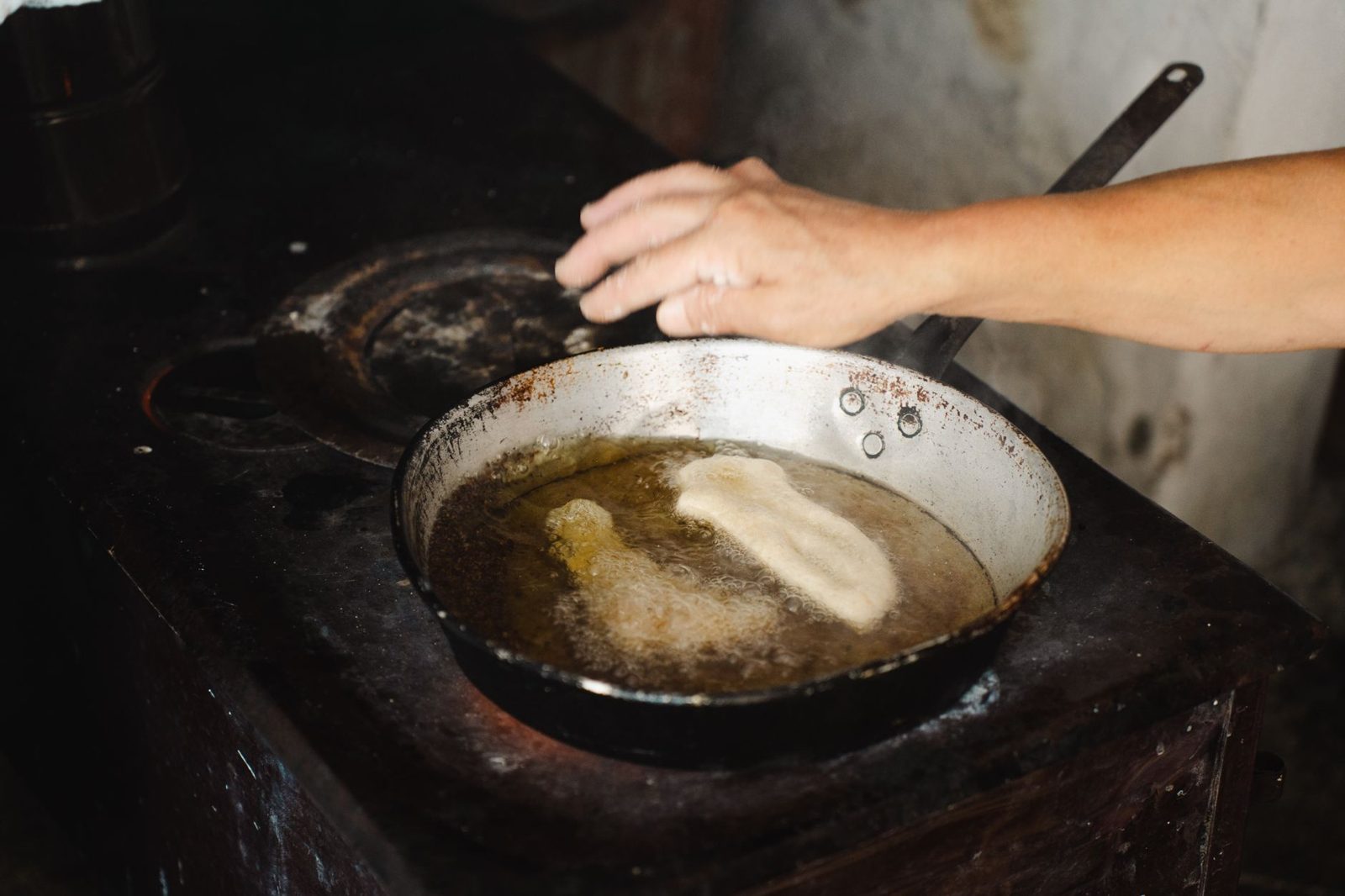 Budapest street food: a fresh langos topped with sour cream and cheese