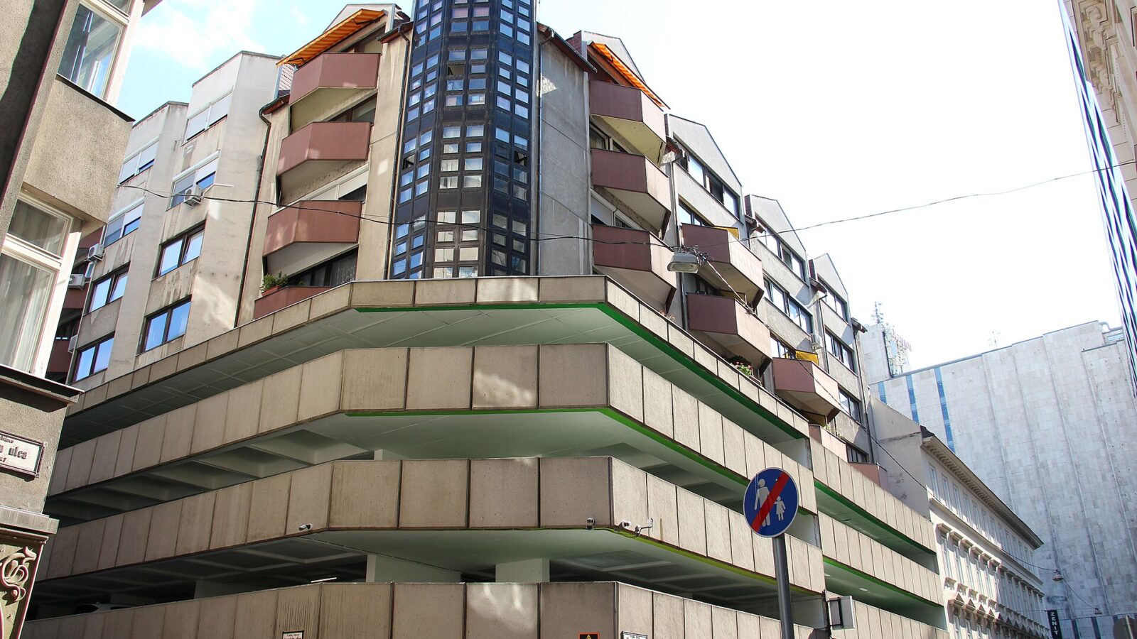The concrete decks of the multi-storey car park on Aranykéz utca in central Budapest, with apartments built on top