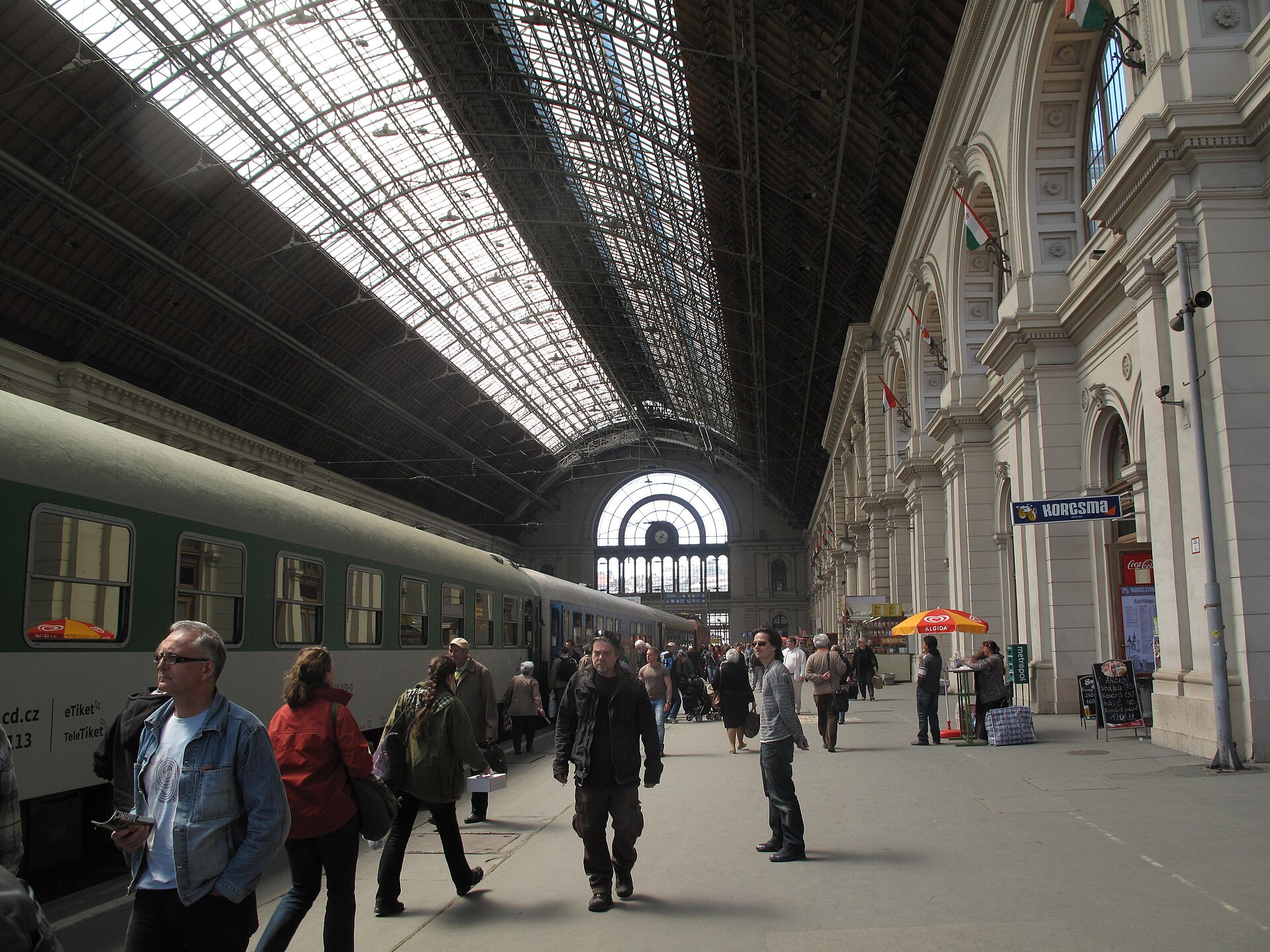 A train platform at Budapest's Keleti station with a Czech Railways carriage waiting to depart